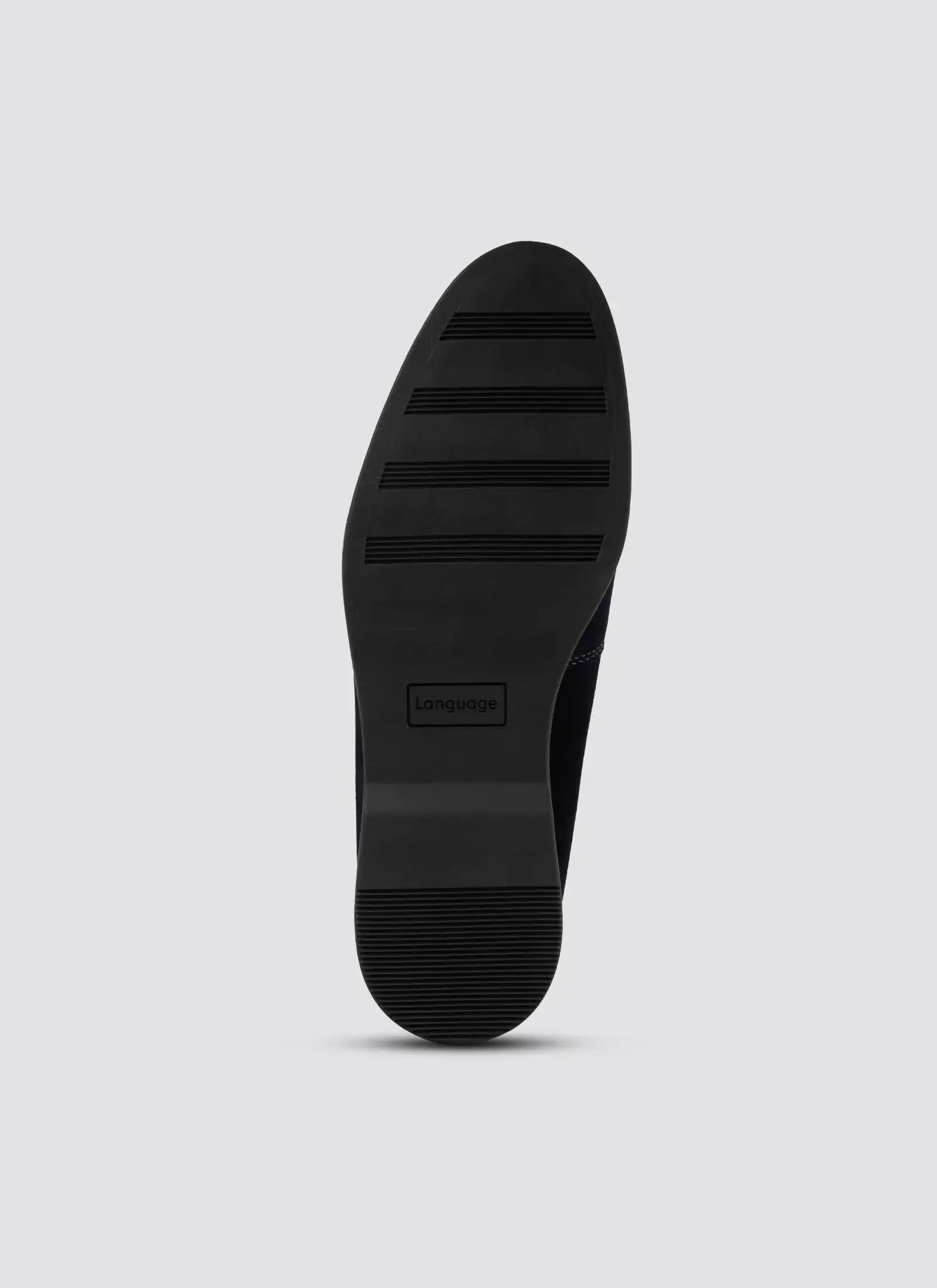 Black rubber shoe sole with textured grip and embossed branding, viewed from bottom