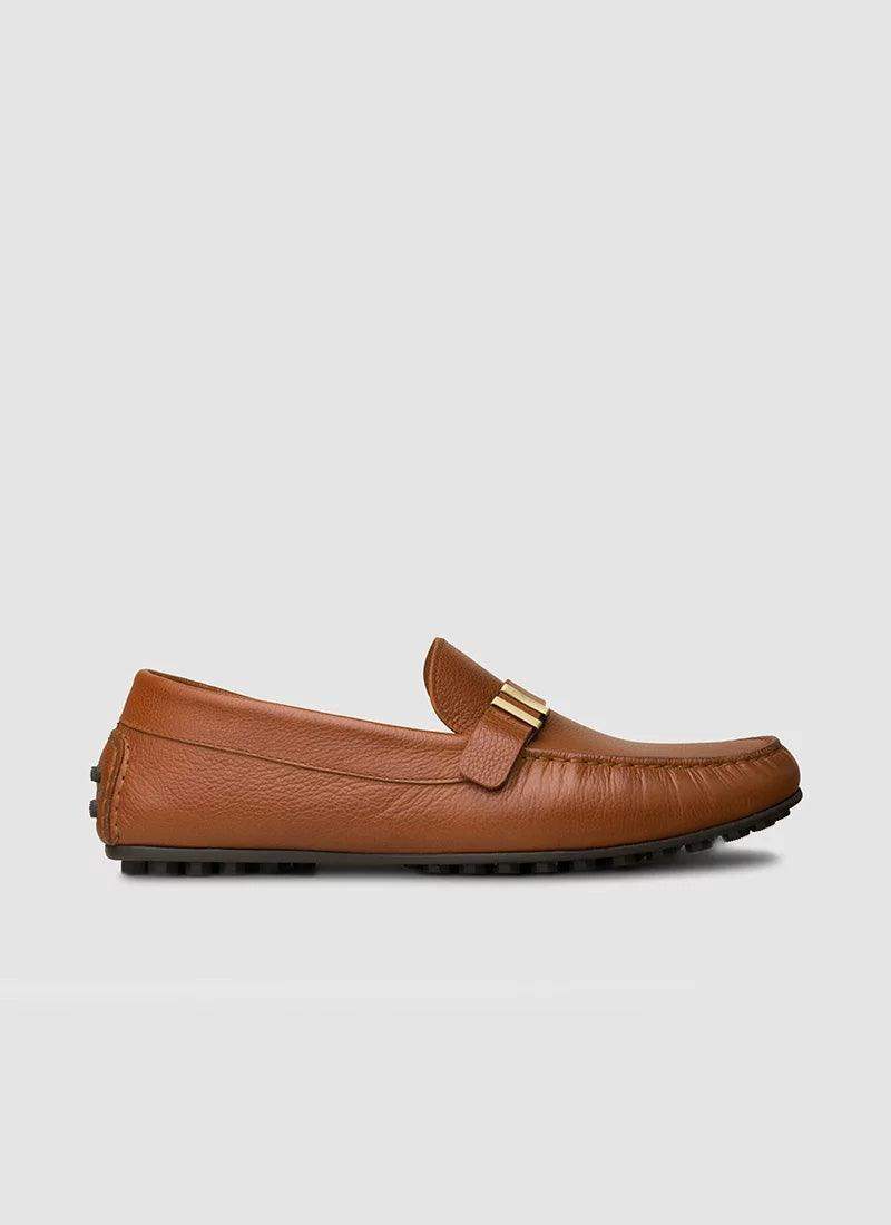 Tan leather loafer for men with textured rubber sole and gold accent on vamp, stylish footwear