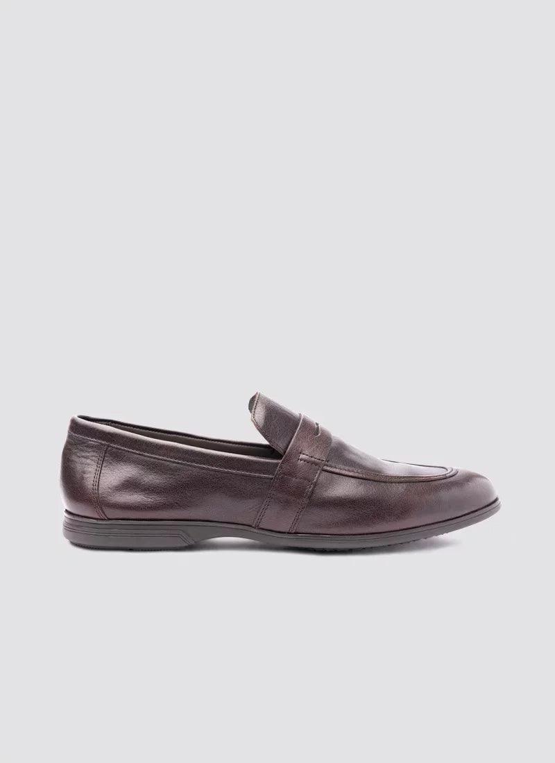 Brown leather men's loafer with classic stitching and rubber sole on a plain background