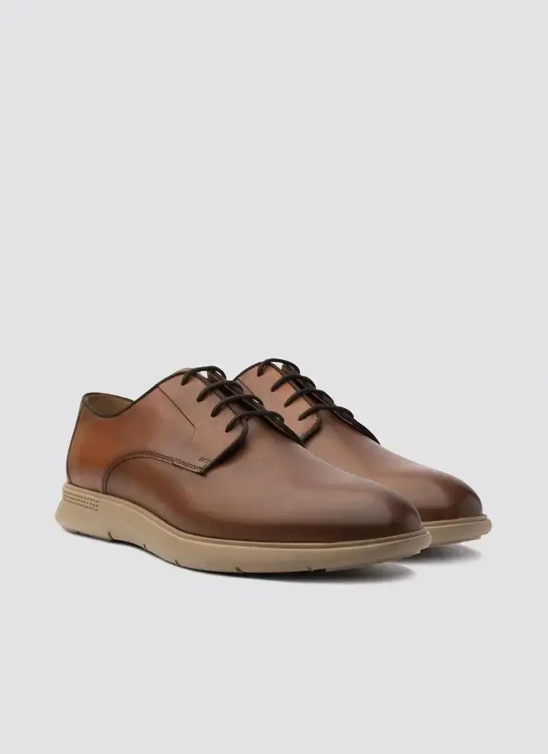 Men's tan leather lace-up dress shoes with beige sole, elegant formal footwear
