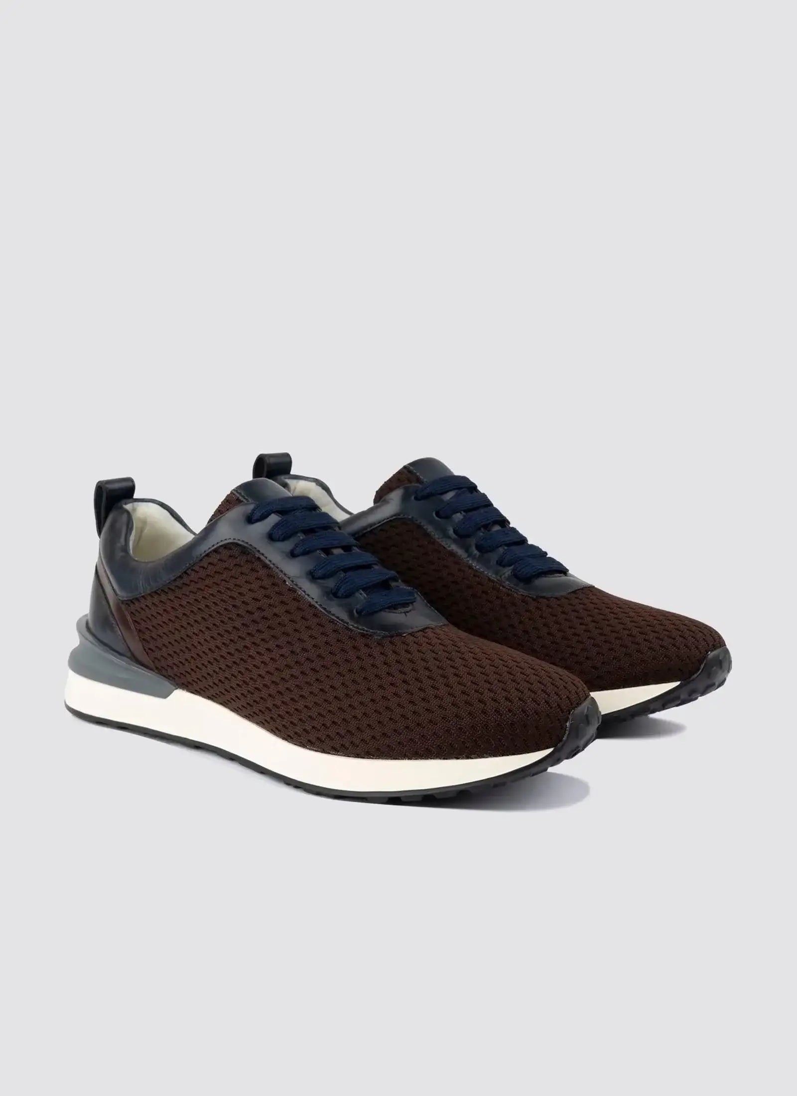 Men's brown mesh sneakers with navy blue laces and white soles, athletic casual shoes