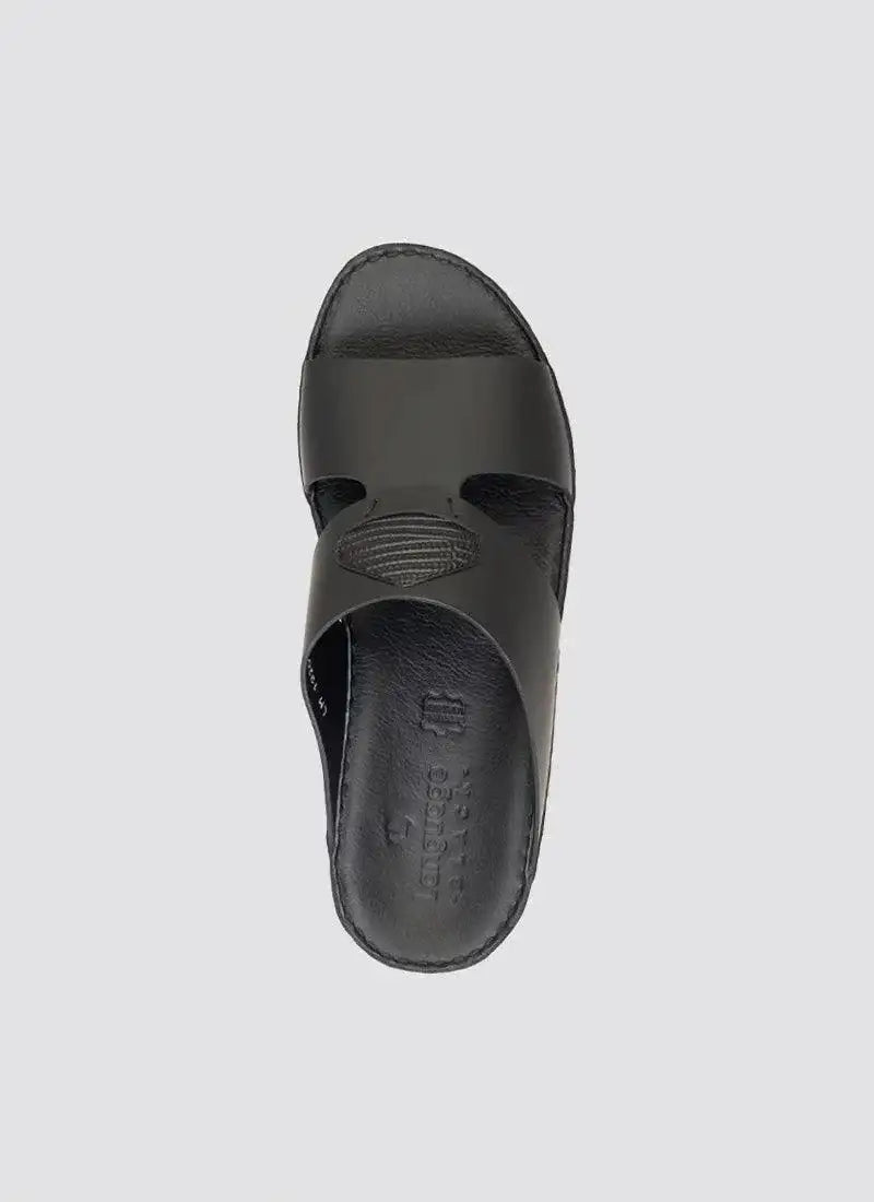 Black leather men's open toe slip-on sandal with cutout detail, top view