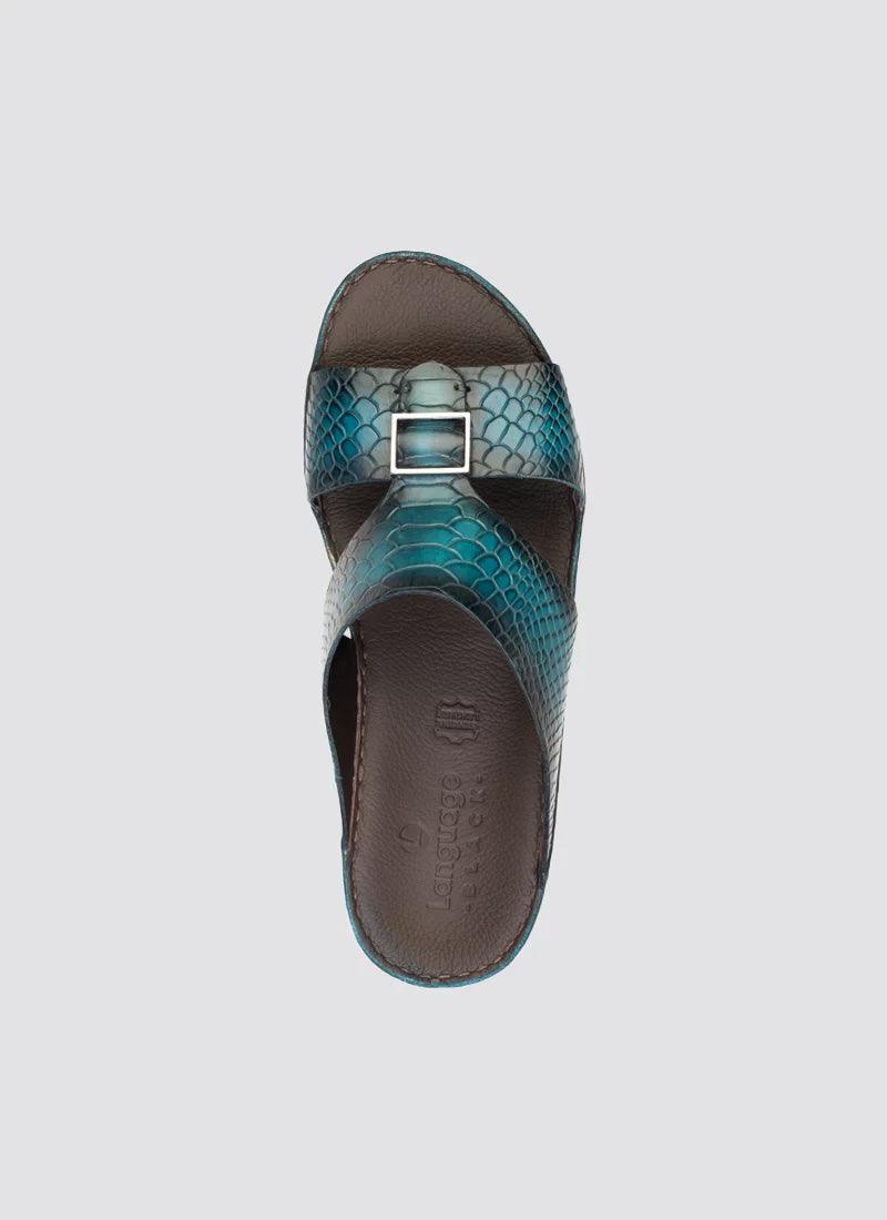 Turquoise slip-on sandal with textured pattern and buckle, men's leather footwear