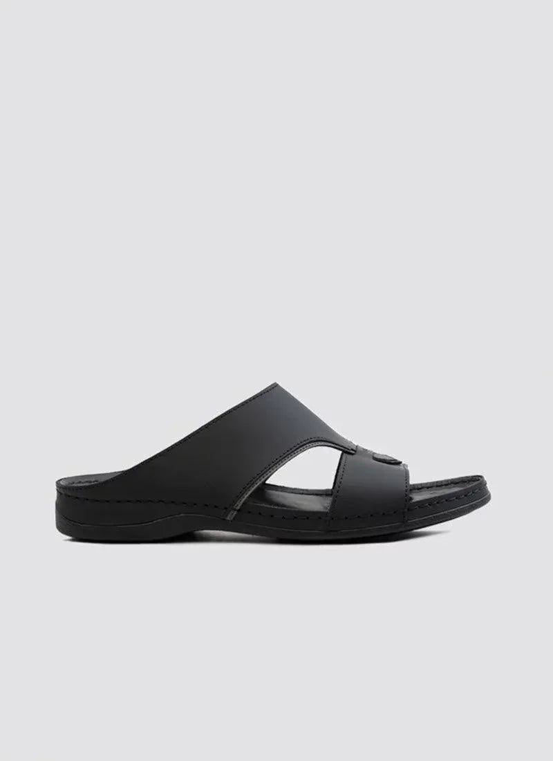 Black leather men's slip-on sandal with open toe and cutout detailing on white background