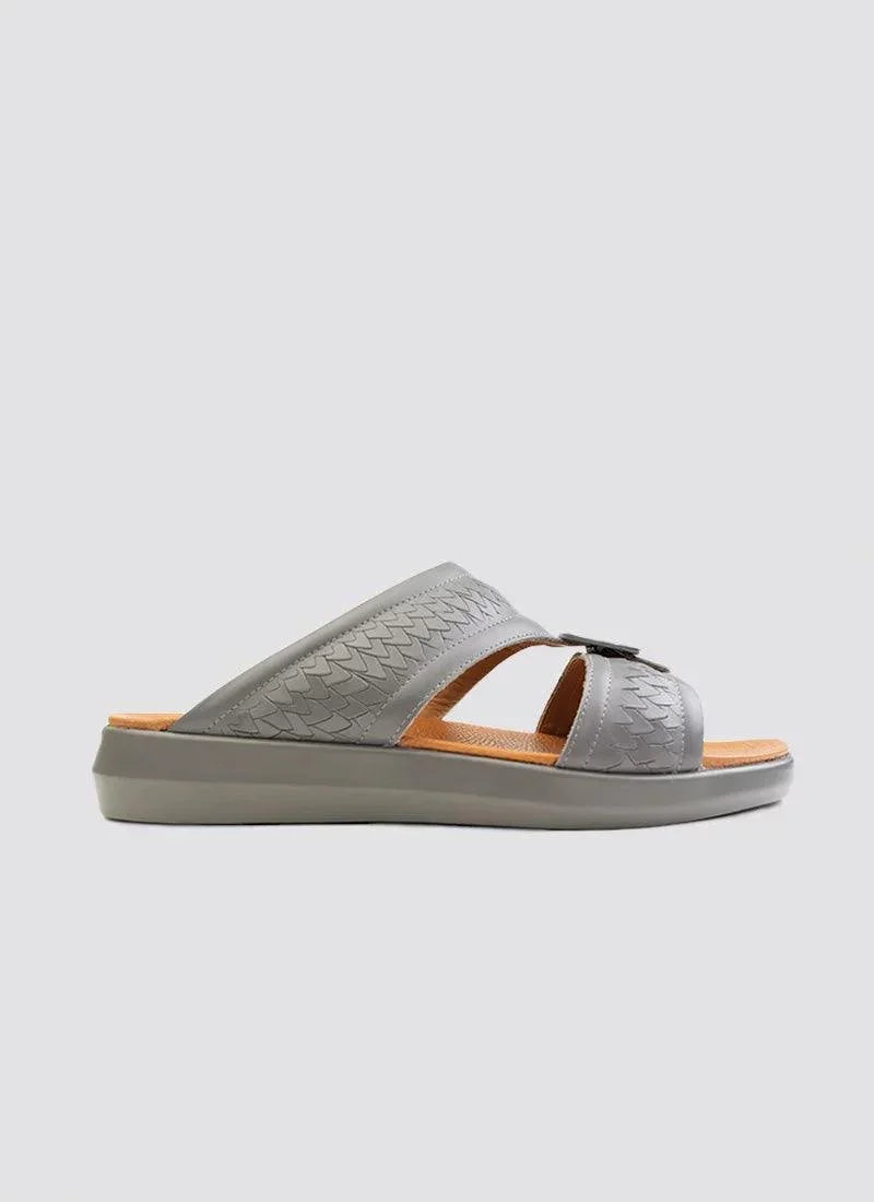 Grey slip-on men's sandal with textured leather straps and open toe design, side view