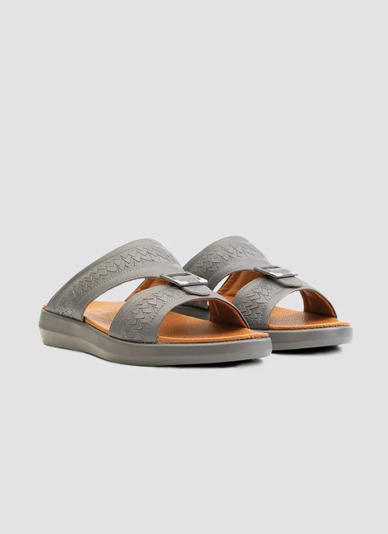 Men's grey leather slip-on sandals with buckle detail and textured straps on white background
