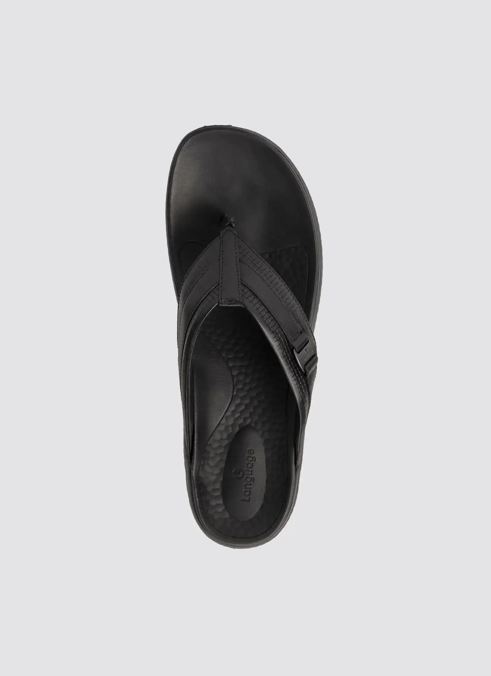 Black leather men's flip flop sandal with textured footbed, top view