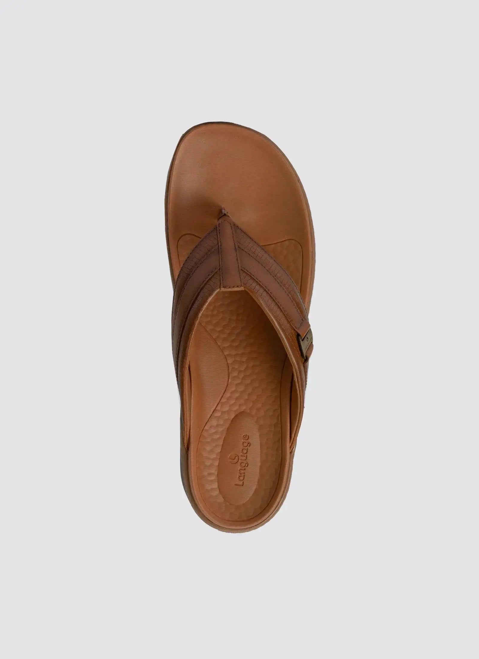 Tan brown men's leather thong sandal with textured footbed, top view on plain background