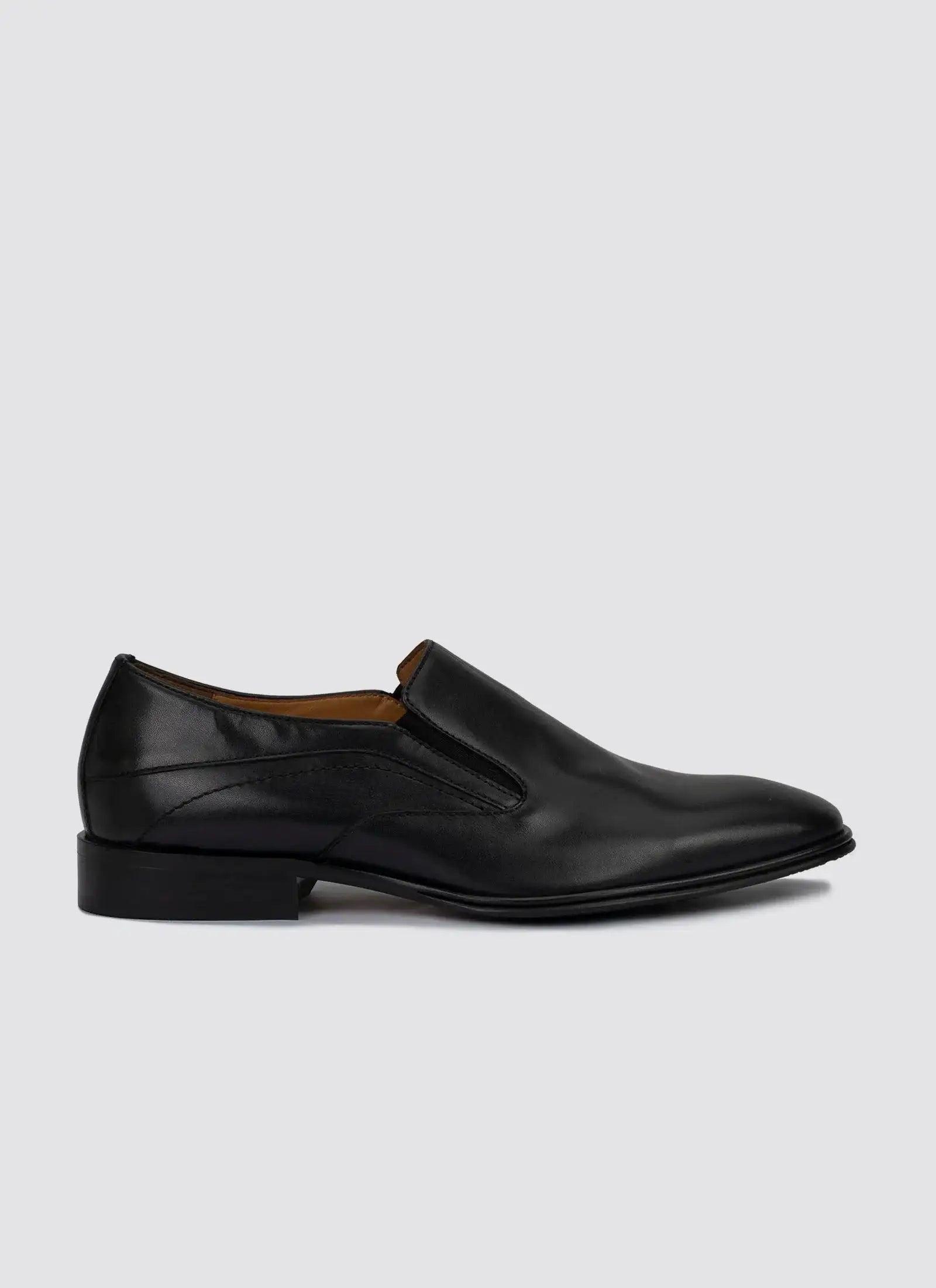 Black leather slip-on formal shoe for men with pointed toe and low heel #color_black