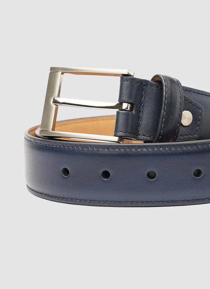 Navy blue leather belt with silver buckle and stitched edges on a light background