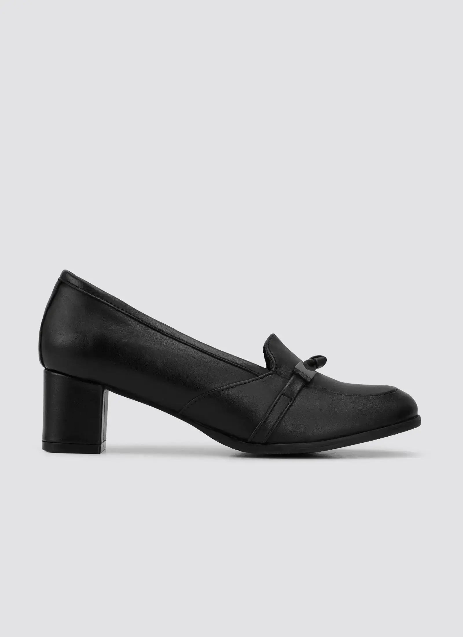 Black leather women's block heel loafer with bow detail on plain background