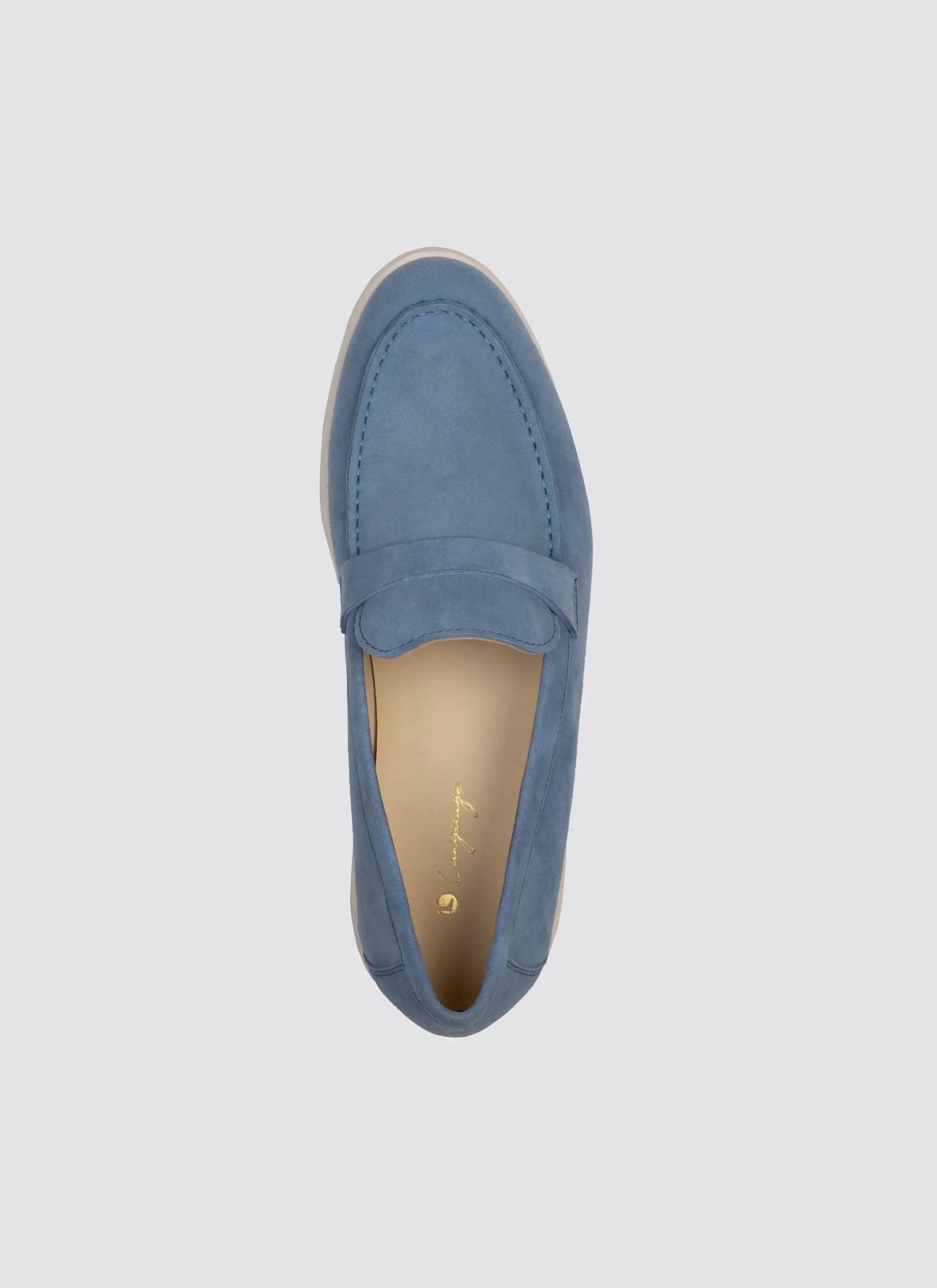 Sky blue suede loafer shoe for men on white background, top view