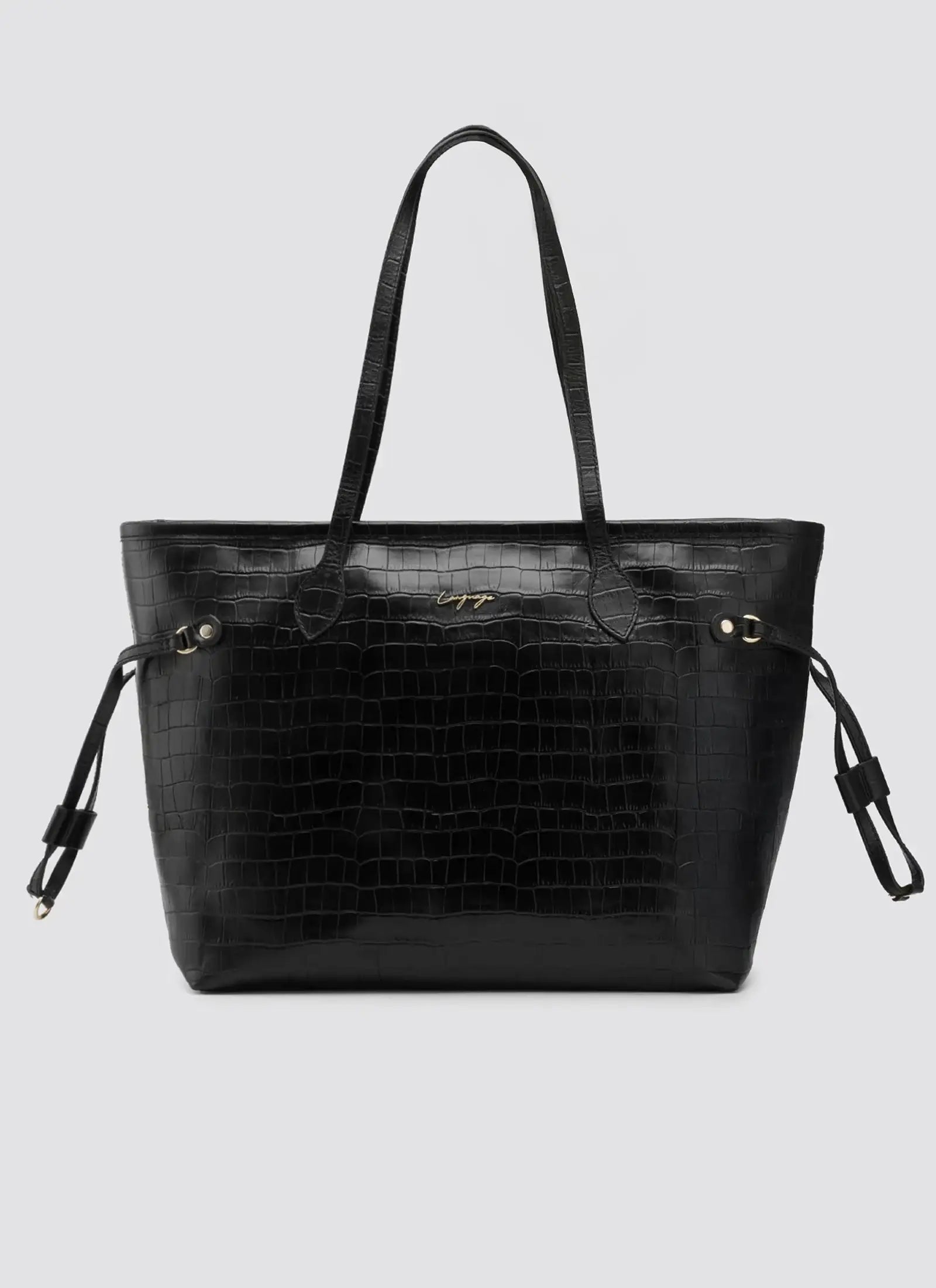 Black textured handbag on a light gray background