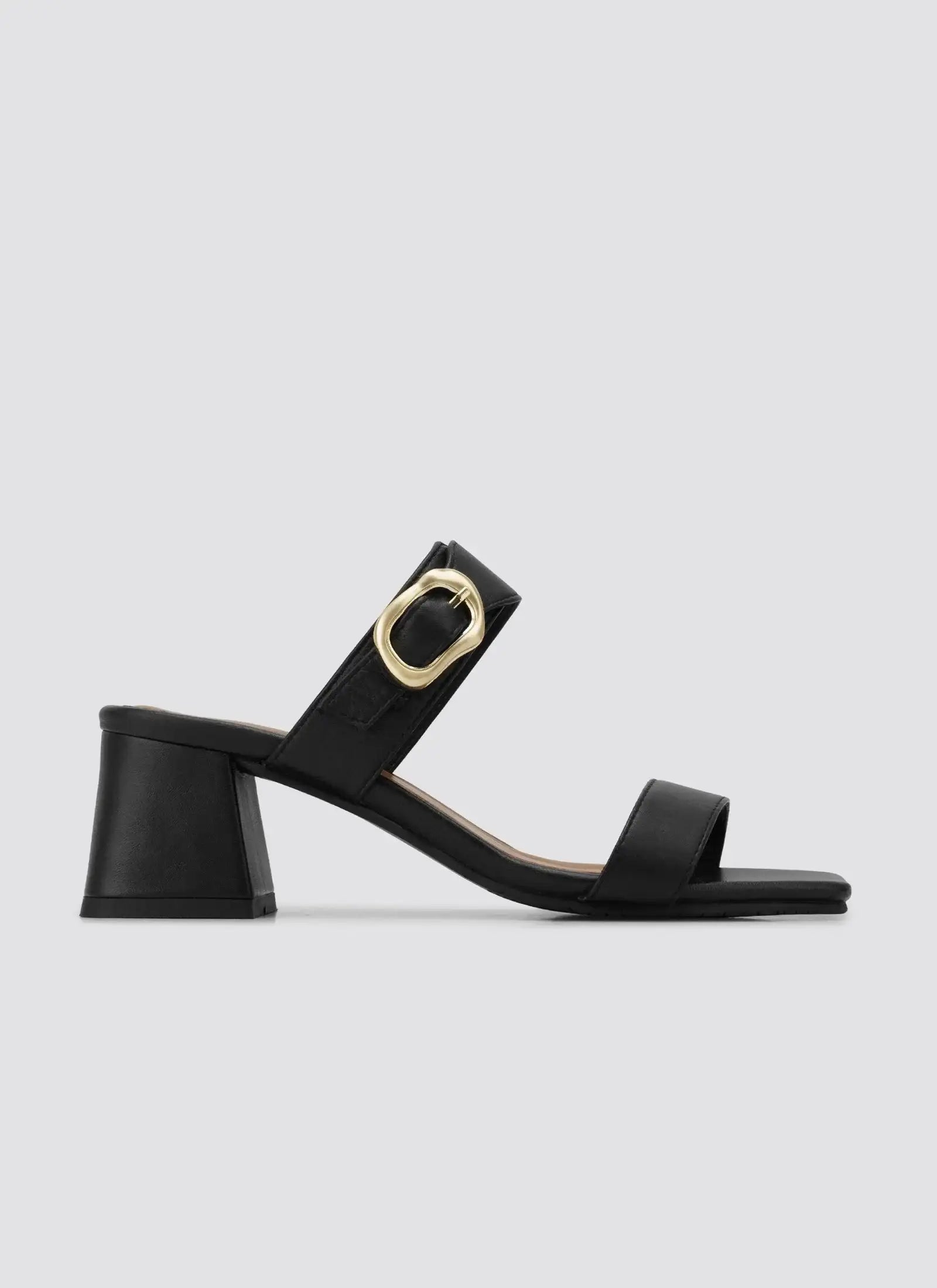 Black block heel sandal for women with gold buckle and open toe design on white background