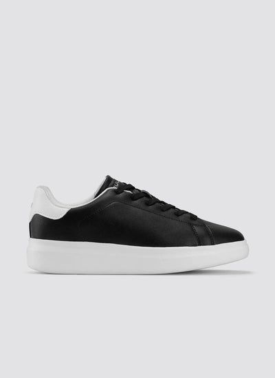 Black and white leather sneaker with white sole, minimalist men's casual footwear 