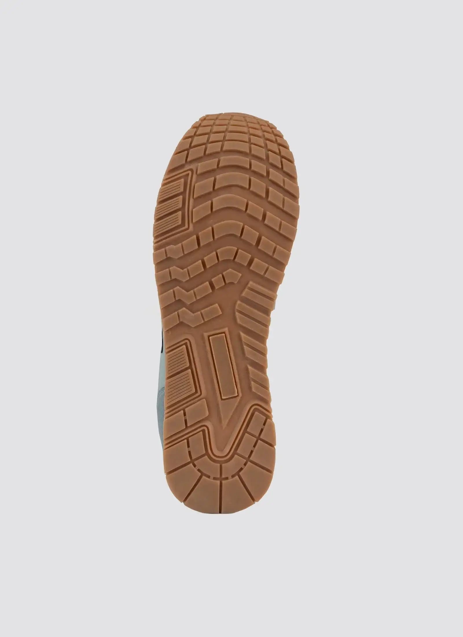 Textured brown rubber sneaker sole with grip tread for men and women footwear  