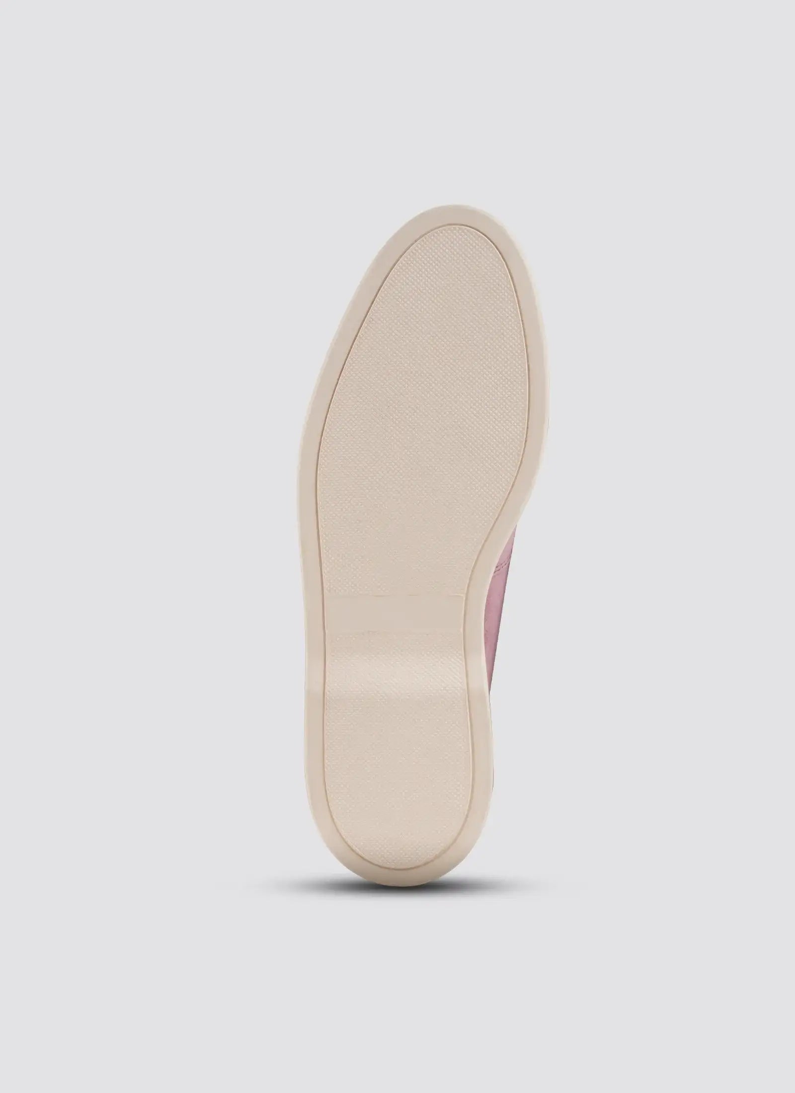 Beige shoe sole on a light gray background 