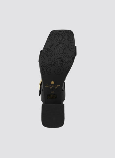 Black sandal sole with circular tread pattern and gold branding, square toe design 