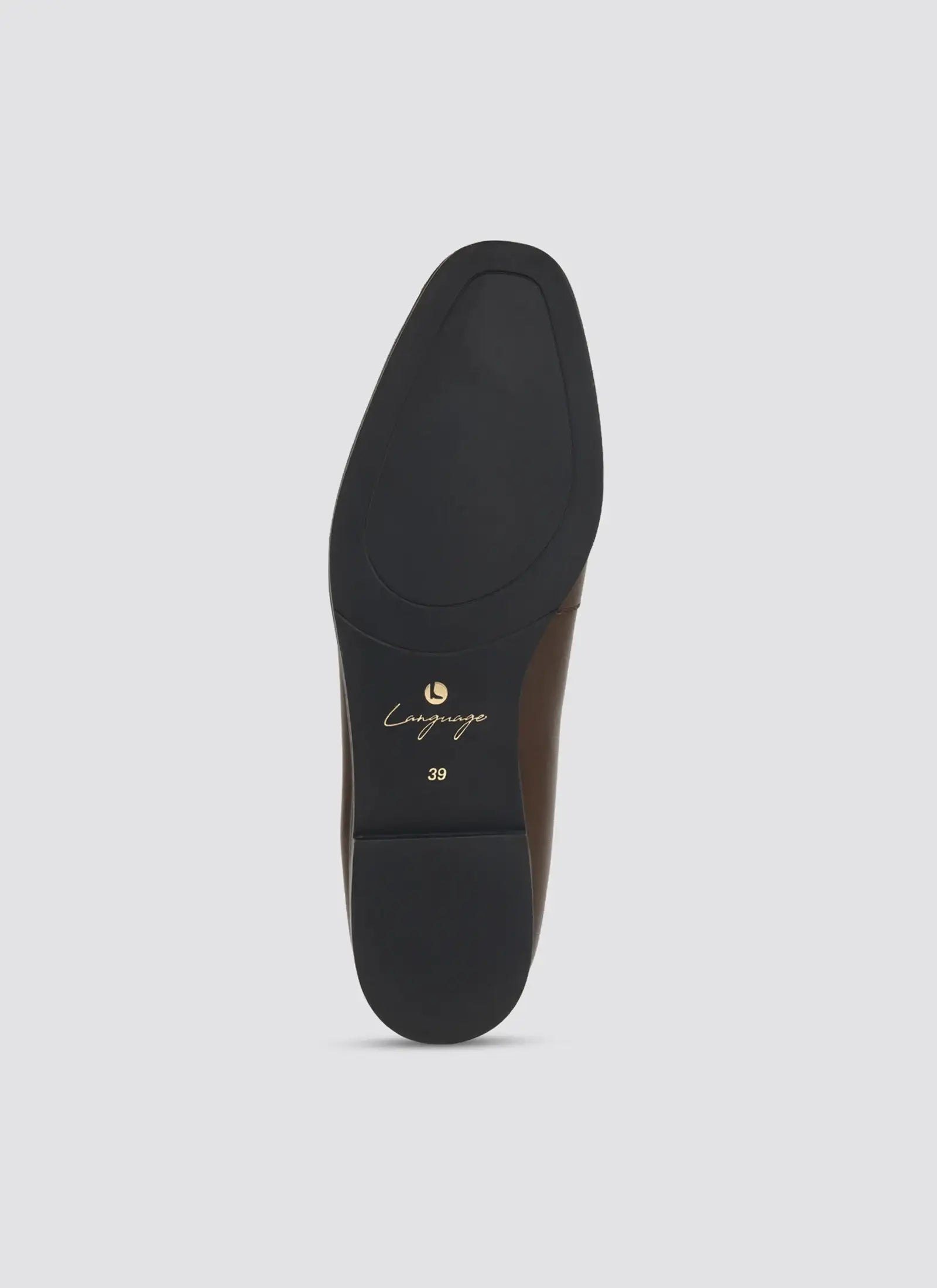 Black shoe sole with 'L' logo on a light gray background 