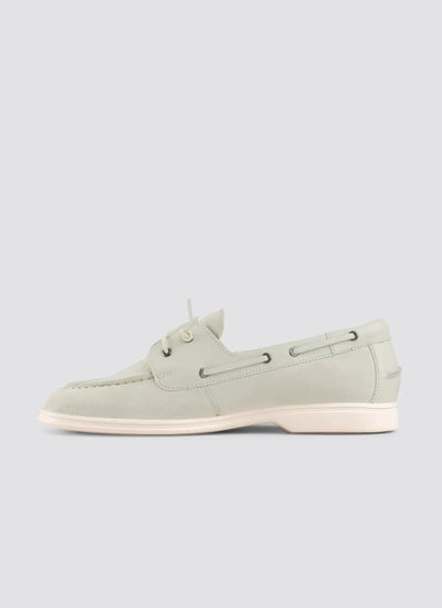 Light gray boat shoe on a light gray background 