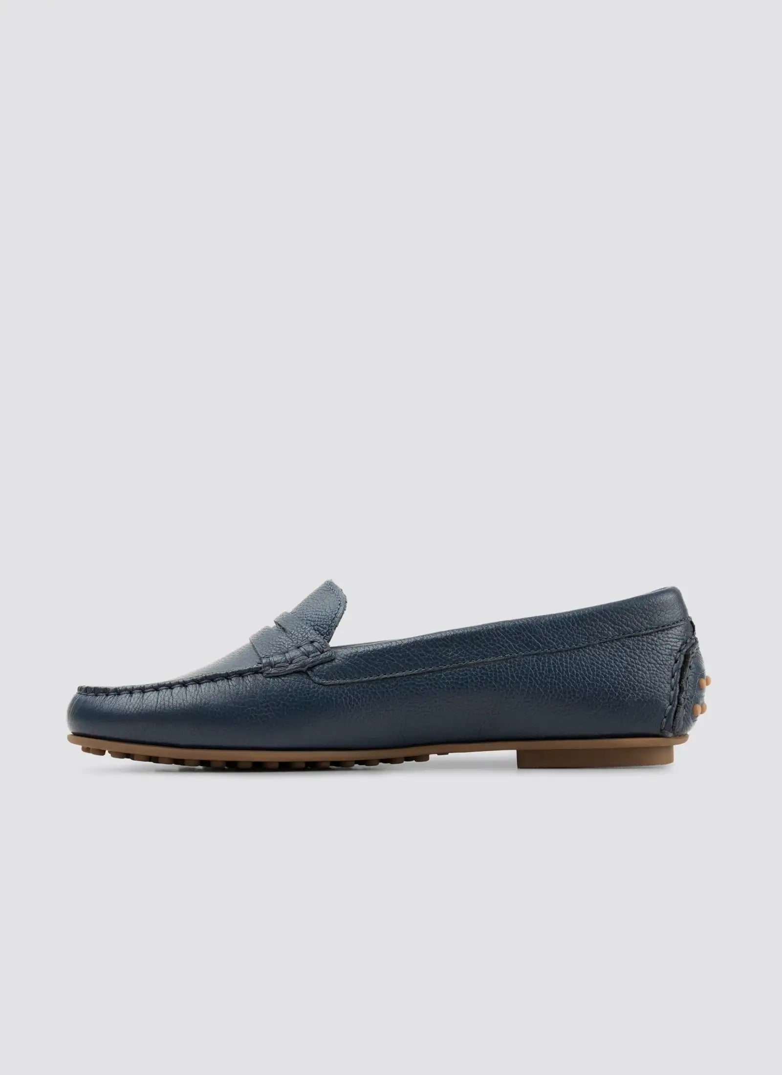 Black loafer shoe on a white background  