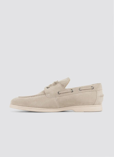 Beige suede men's loafer with lace detailing, side view, on white background 