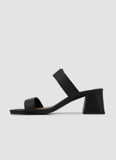 Black block heel sandal with double straps for women, side profile on plain background 