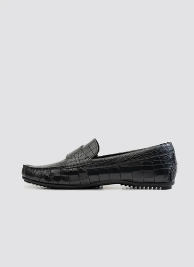 Black leather loafer with crocodile pattern texture, men's formal footwear, side view 