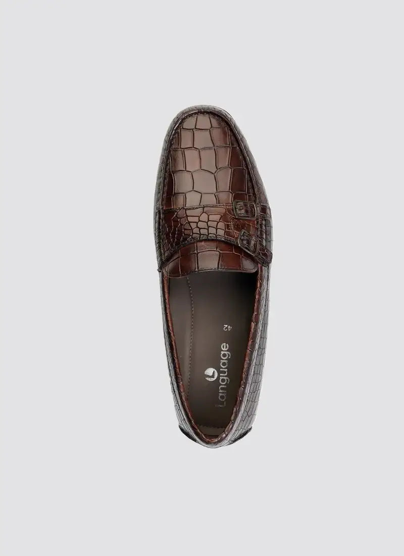 Top view of brown crocodile-pattern leather loafer shoe for men on white background 