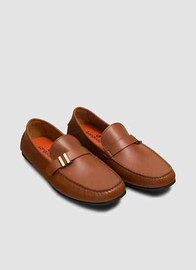 Tan leather loafers for men with gold accent, slip-on moccasins on white background 