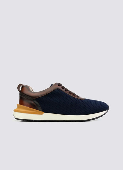 Navy blue mesh sneaker with brown leather accents, white sole, and lace-up design for men 