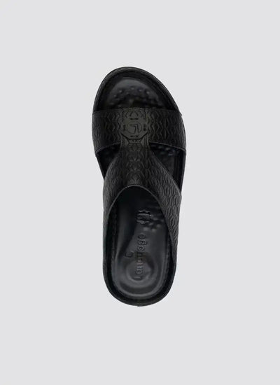 Top view of black leather slide sandal with textured criss-cross straps for men 