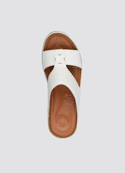 White leather slip-on sandal with textured cross-strap design and brown footbed 