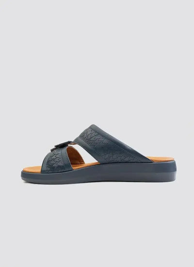 Men's navy blue slip-on sandal with textured leather straps and cushioned sole on white background 