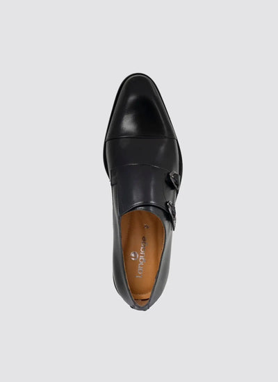 Black leather double monk strap men's formal shoe top view on grey background 