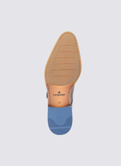 Close-up of men's dress shoe sole with tan textured forefoot and blue rubber heel, size 42. 