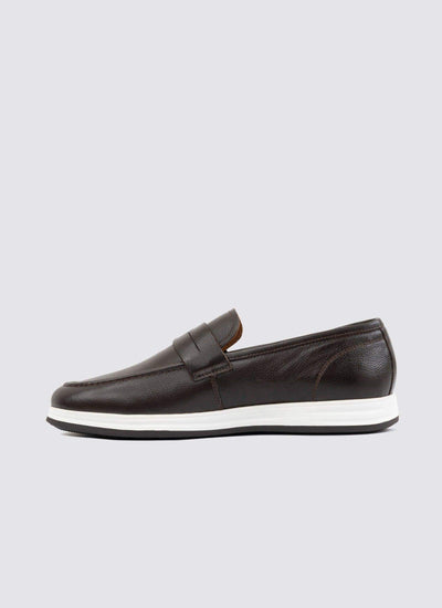 Men’s dark brown leather loafer with white rubber sole, side profile, on grey background 