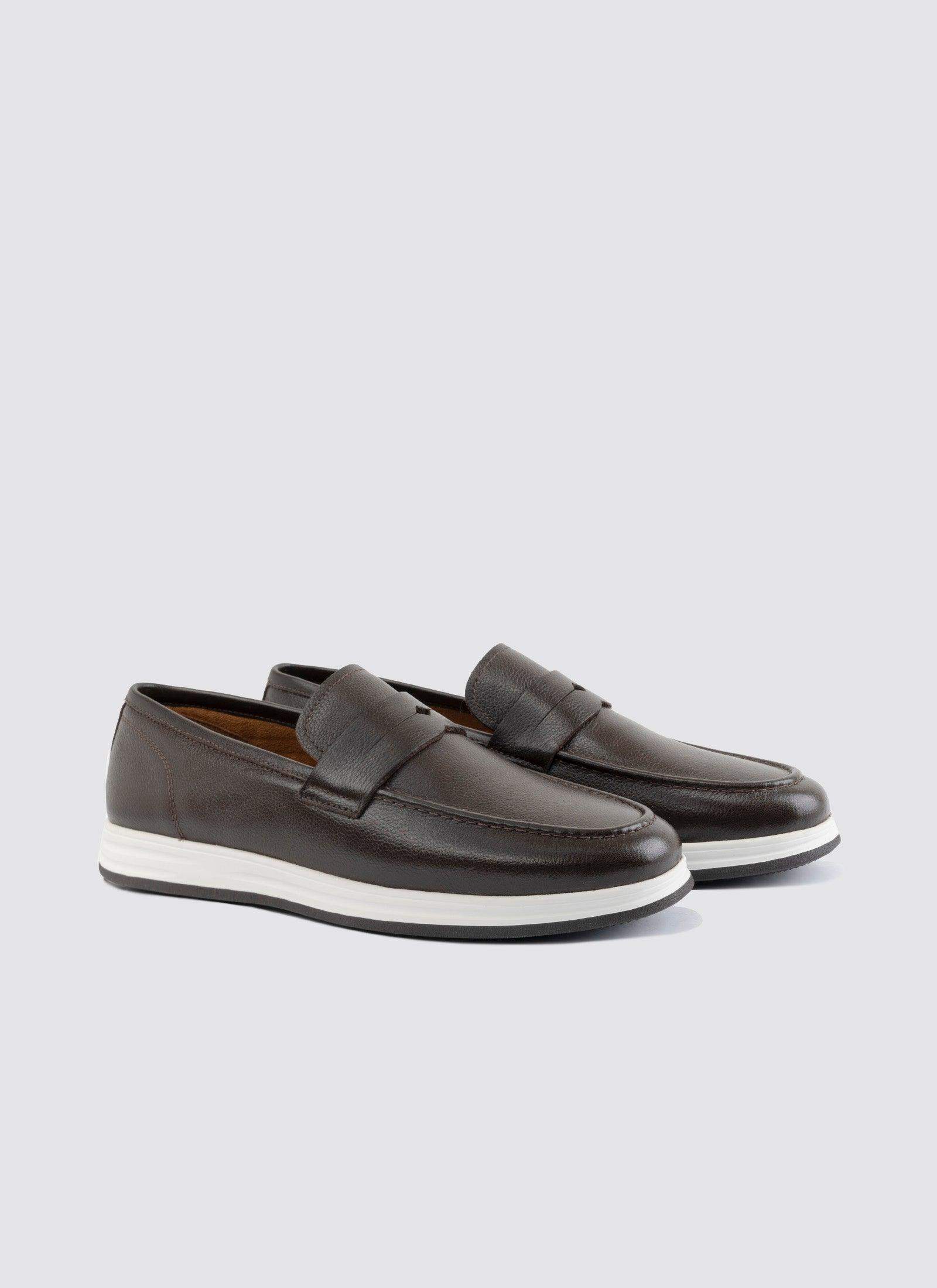 Men's brown leather loafers with white rubber soles on a plain background #color_brown