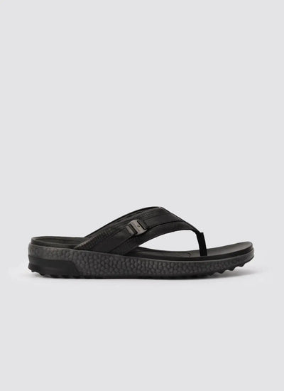 Black men's leather flip flop sandal with textured sole on white background  