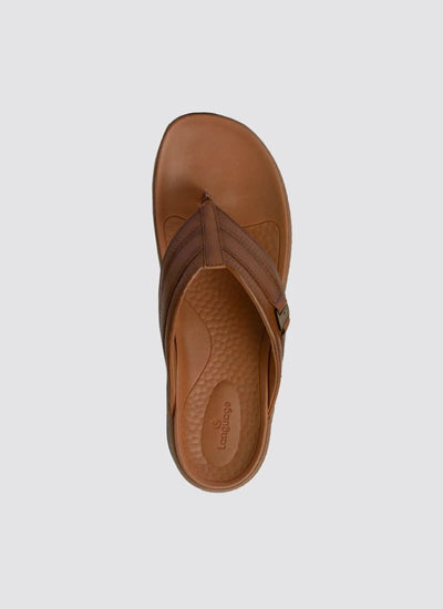 Tan brown men's leather thong sandal with textured footbed, top view on plain background  