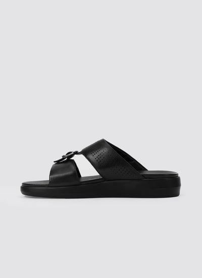 Black sandal on a light gray background 