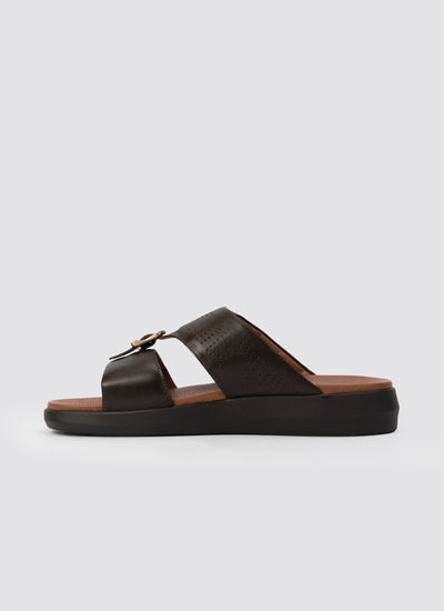 Black sandal with a wooden sole on a light gray background 