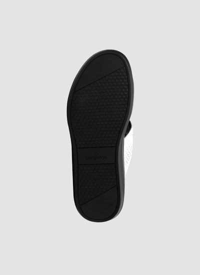 Black sandal sole on a light gray background 