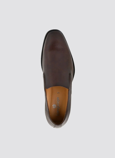 Top view of a brown leather men's slip-on dress shoe with a rounded square toe 