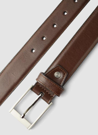 Men's brown leather belt with silver buckle on light background 