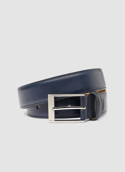 Men's navy blue leather belt with silver buckle on a plain background 