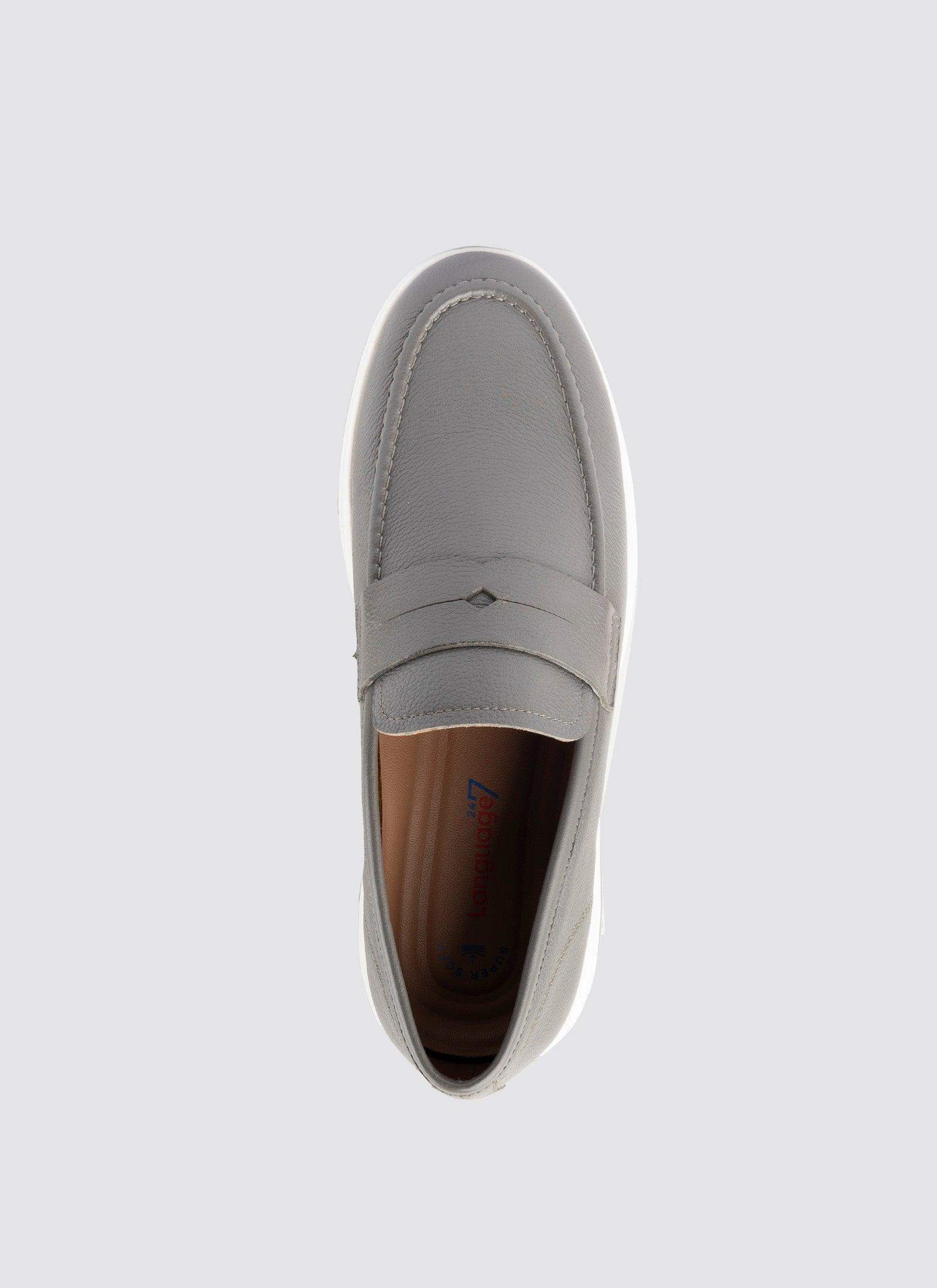 Top view of a grey leather loafer with white sole for men on a plain background 