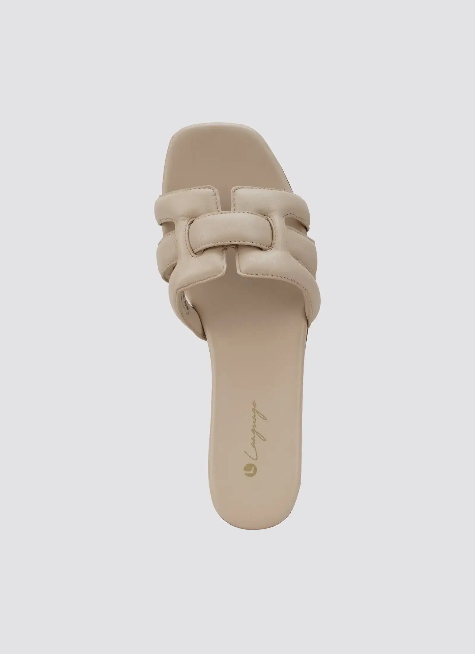 Beige women's slip-on sandal with cushioned woven straps and open square toe, top view  