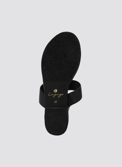 Black women's sandal back view with floral textured sole and open toe design 