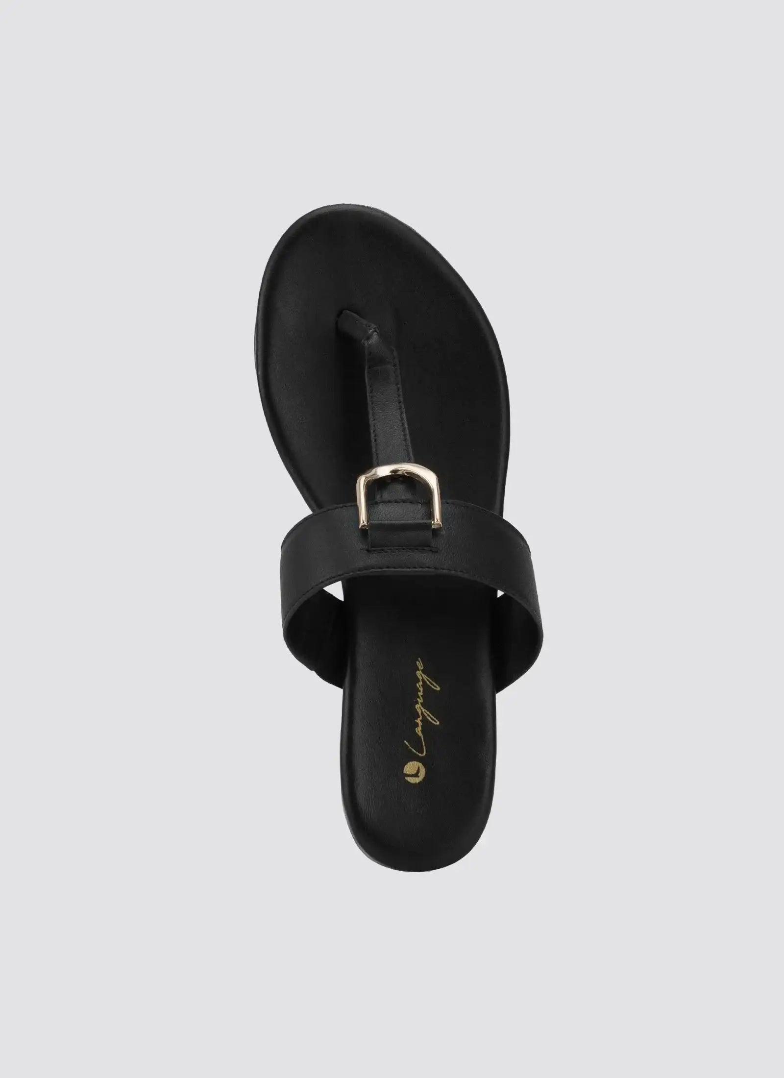 Black leather sandal with gold buckle detail, toe loop, flat sole, top view 